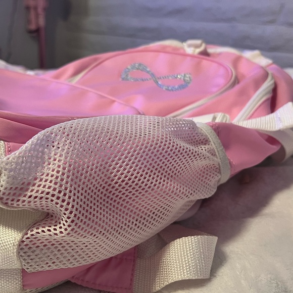 LIGHT PINK NFINITY BACKPACK AS IS - Picture 10 of 11